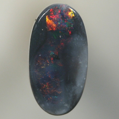 SOLID BLACK OPAL Sparkles of red and orange between black opal